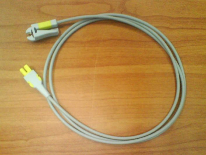 This is a reusable SpO2 sensor probe, likely a pediatric or neonatal type, used to measure blood oxygen saturation and pulse rate