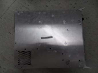 The item in the image appears to be an electronic component or chassis, possibly related to industrial automation or a power supply unit, but it is difficult to identify with certainty as there are no visible brand names or model numbers in the image or available search results