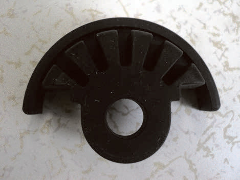 This is a rubber violin practice mute, also known as a Tourte-style mute. It is used to dampen the sound of a violin or viola during practice sessions.