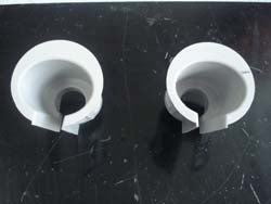These are vacuum-formed ceramic fiber foundry hot top casting rings, also known as split ring bushings