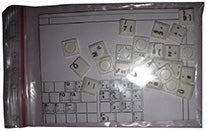 The items in the image appear to be game counters for a board game called Strategy 1.