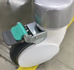This is a swivel caster wheel, likely made of plastic or rubber, with a locking mechanism
