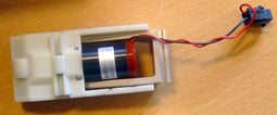This appears to be a small DC gear motor assembly within a 3D-printed holder