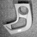 The image appears to show a white car interior trim piece, possibly for a center console or dashboard, but specific identification is not possible with low confidence due to a lack of useful information.