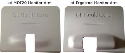 The image displays two different back covers for monitor arms from Ergotron and GE Healthcare, highlighting their differences in design.