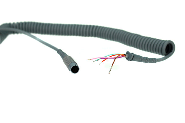 Coiled retractile cable labeled SP-6AH104 with exposed wire ends for electrical connection.