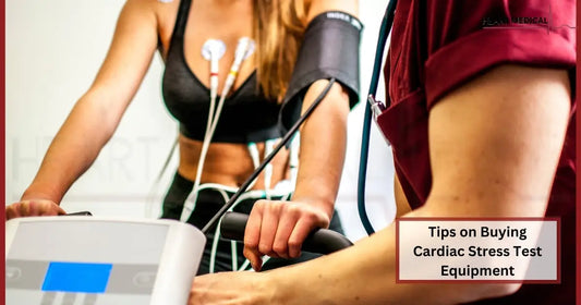 Cardiologist reviewing cardiac stress test data on a digital monitor to assess heart function.